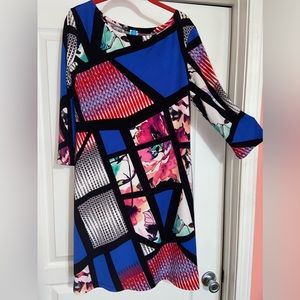 Never worn and no tags, woman’s mid length dress sz l.